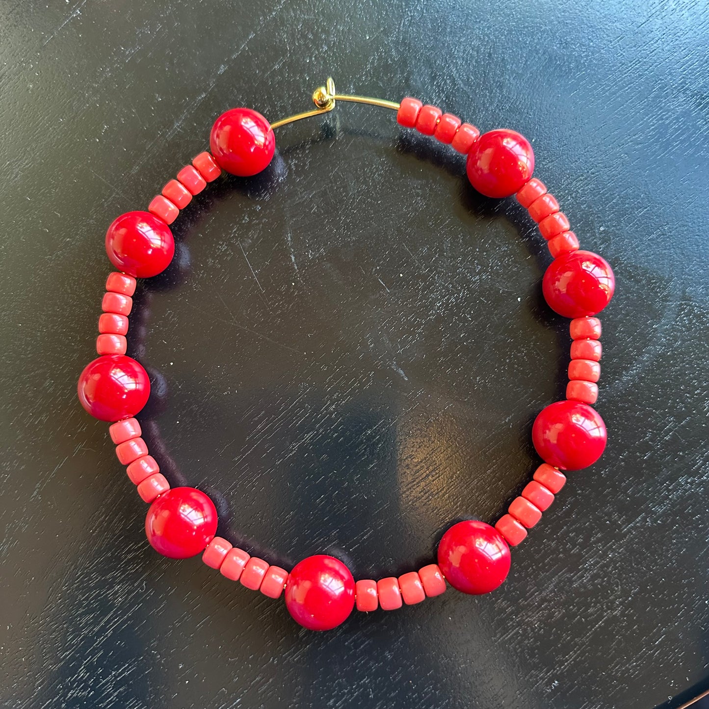 gold choker necklace, red coral choker, handmade statement jewellery, gold filled necklace, coral jewellery, red statement necklace, elegant choker, gemstone jewellery, handmade gold necklace, coral beads necklace, modern statement jewellery